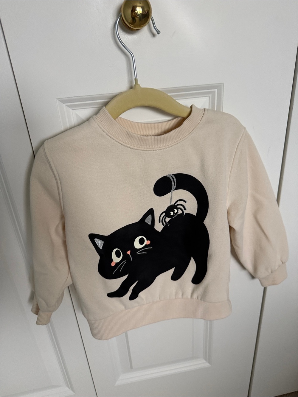 H&M Cream Sweatshirt with Black Cat Graphic